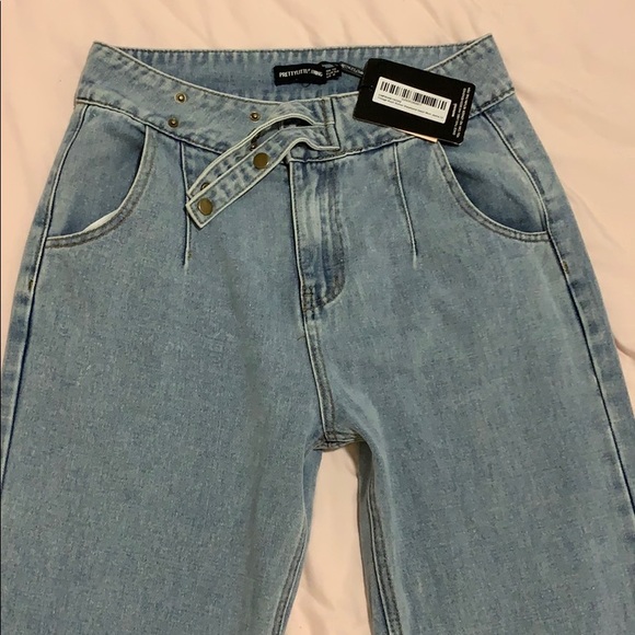 Never worn. Best to size up. X - Picture 3 of 3